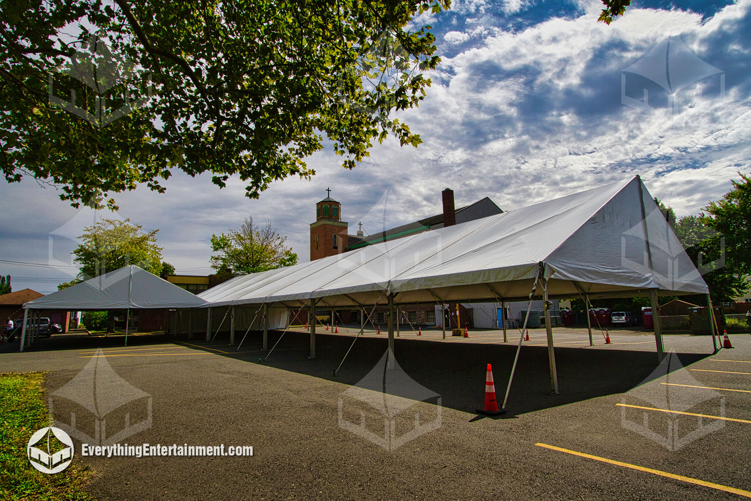 40x120 Frame Tent setup in a parking lot