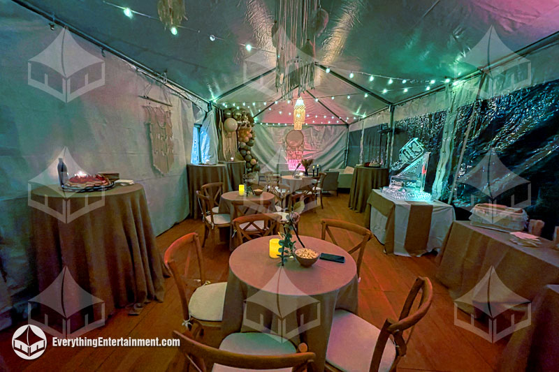 15x60 frame tent interior with party rentals and lighting.