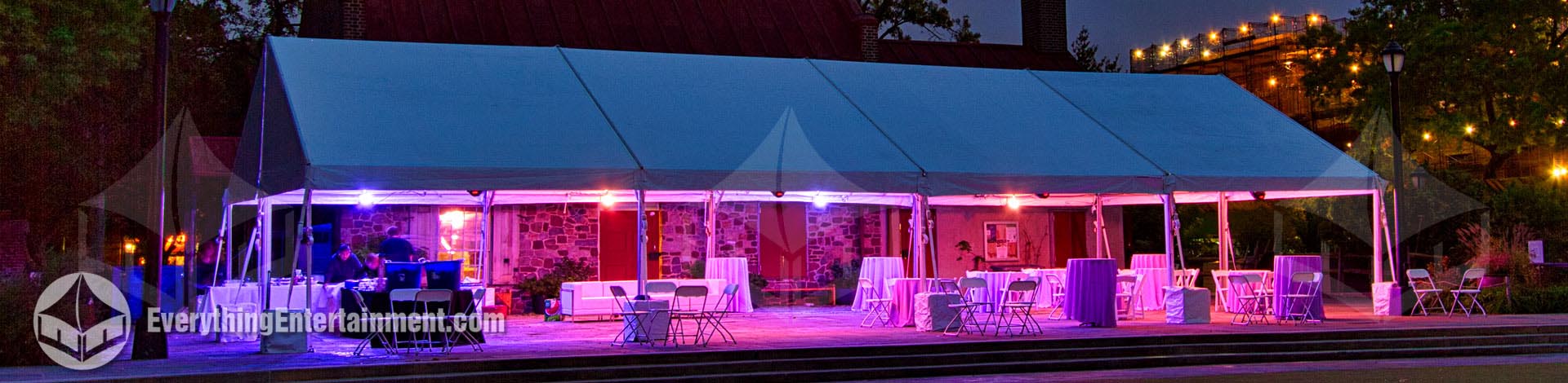 30x60 tent with pink and lavender lighting