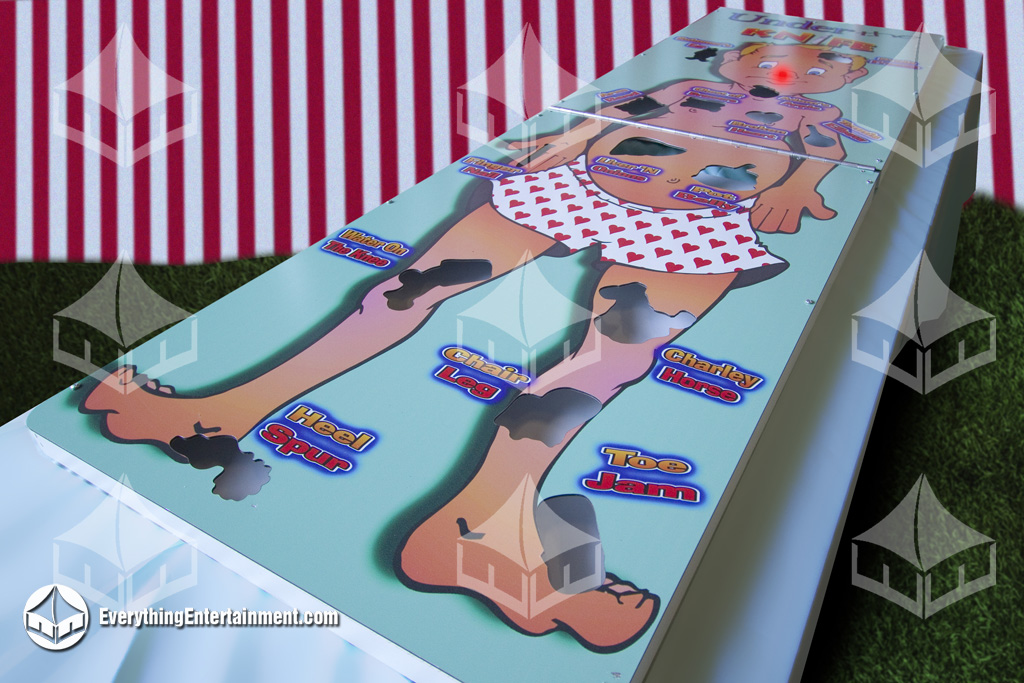 surgery game on table, inside a red and white carnival booth