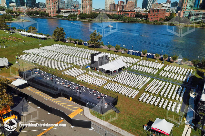 Aerial view of 3500 chairs and multiple tents setup for an outdoor concert in New Jersey