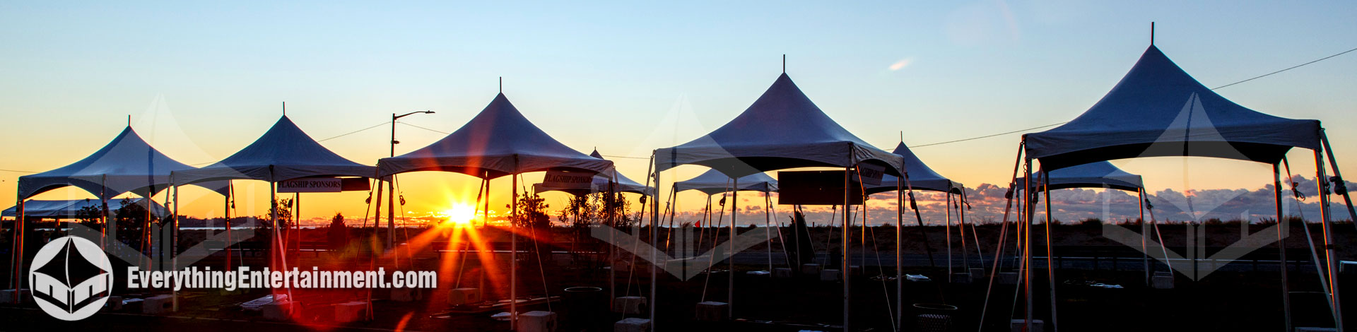 Multiple 10x10 high peak tents at sunrise