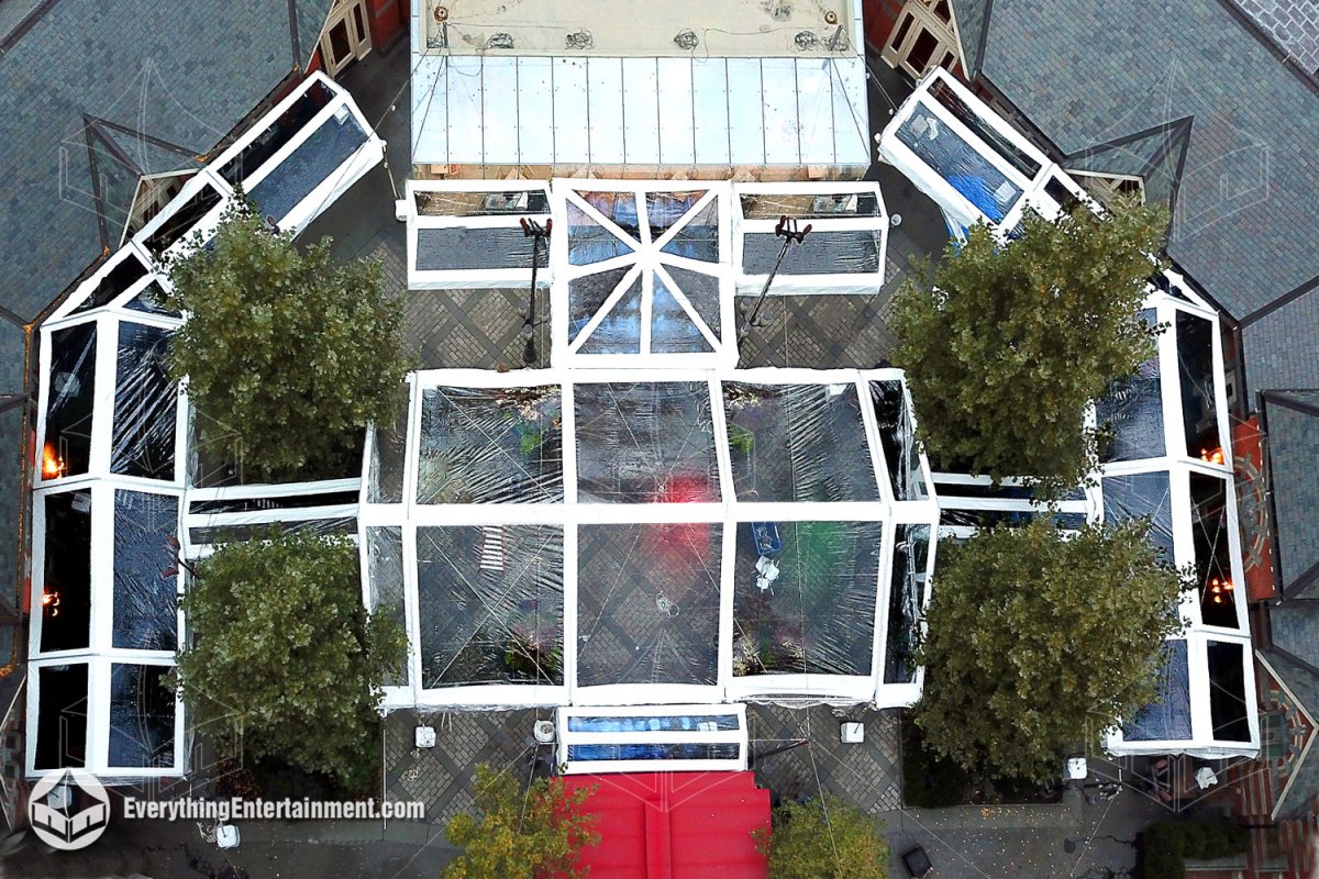 High aerial view of a multi-tent clear top layout custom fitted around trees and light poles at Tavern on the Green in NYC by Everything Entertainment.