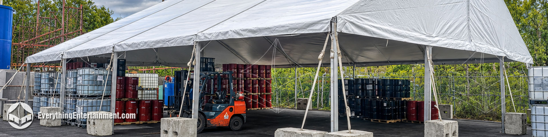 50x60 foot frame tent installed on asphalt in New Jersey as a temporary warehouse space for inventory overflow