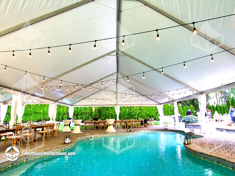 large frame tent over a pool